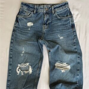 Zara women’s Relaxed Fit Ripped Blue Jeans